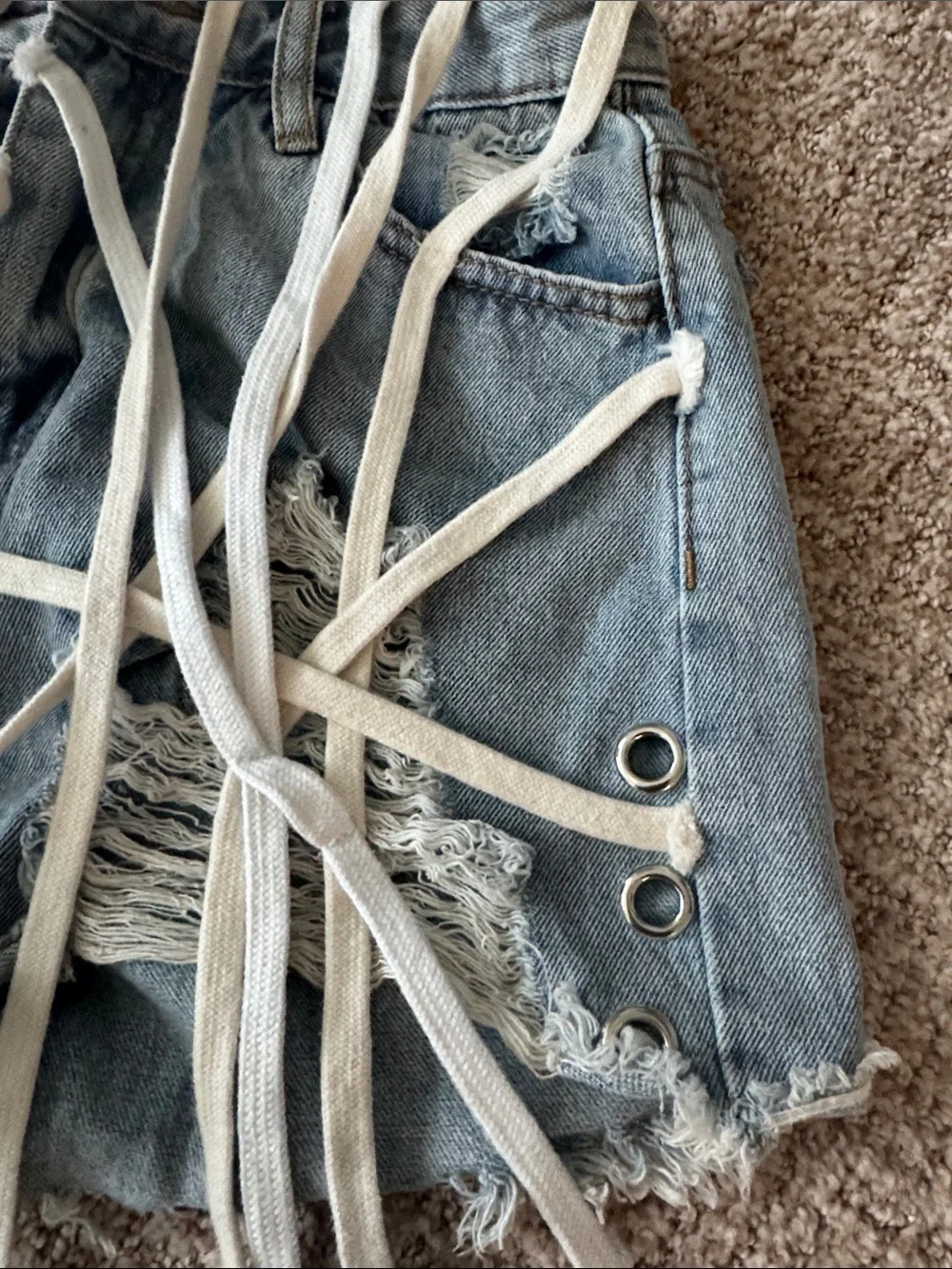Distressed Light Blue Denim Shoe Lace Grommet Fringe Shorts